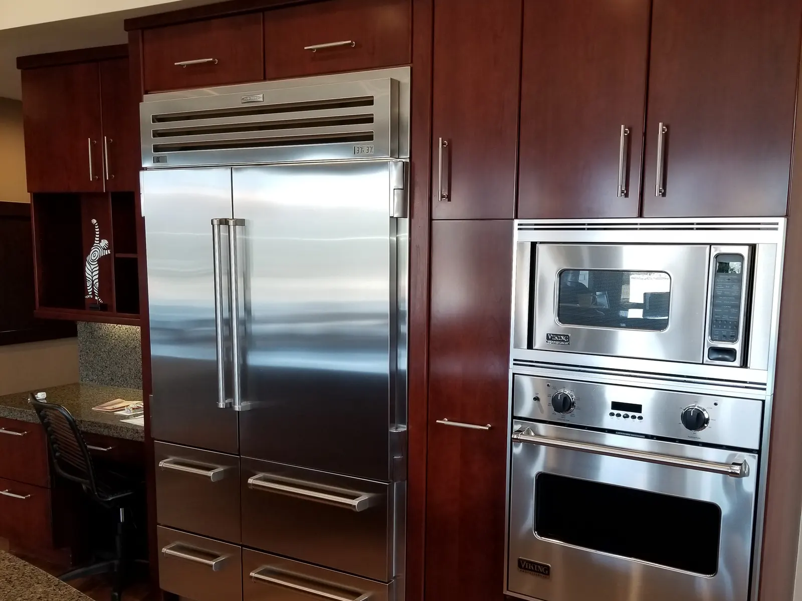 Stainless steel appliances polished to a mirror finish during a deep clean